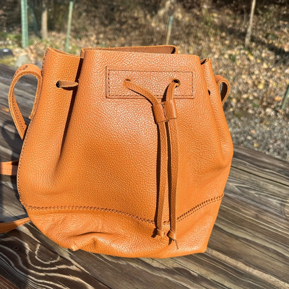 J Crew leather crossbody, pouch style w/ drawstring closure. Excellent condition
